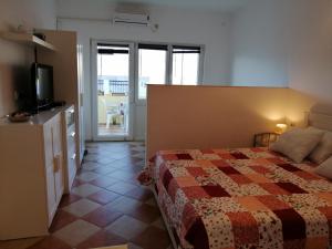 Posteľ alebo postele v izbe v ubytovaní Family apartments Grguric