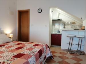 Kuchyňa alebo kuchynka v ubytovaní Family apartments Grguric