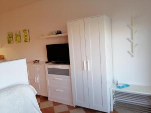 Kuchyňa alebo kuchynka v ubytovaní Family apartments Grguric