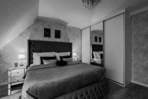 Кровать или кровати в номере Apartmán Blue Moon
