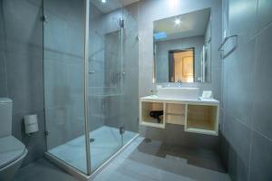 a bathroom with a shower and a sink and a toilet at Convento San Payo in Vila Nova de Cerveira +53 photos