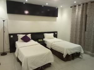 Ένα ή περισσότερα κρεβάτια σε δωμάτιο στο Ebreeze Al Hijaz - Previously Amarena