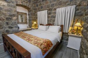 Postel nebo postele na pokoji v ubytování Shirat Hayam Boutique Hotel + 37 fotografií