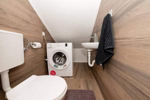 Koupelna v ubytování Apartment White Pearl + 26 fotografií