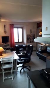 Μια τηλεόραση ή/και κέντρο ψυχαγωγίας στο Appartamento Vista Lago di Como - Italia