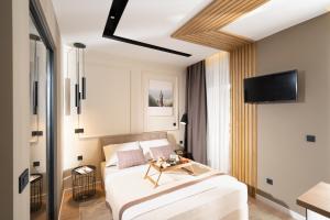 TV a/nebo společenská místnost v ubytování Premium Apartments