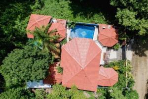 an overhead view of a resort with umbrellas and a pool at Casa Melosa in Potrero