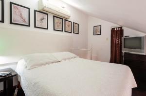 En eller flere senger på et rom på Suite 4B Bazzar, Garden House, Welcome to San Angel