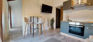 Kuchyň nebo kuchyňský kout v ubytování Guest House Galeb2