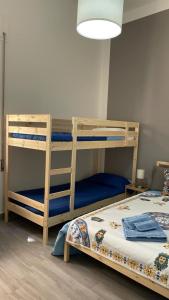 Un pat sau paturi într-o cameră la I Mori CASA VACANZE