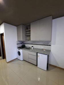 Kuchyň nebo kuchyňský kout v ubytování Monoambiente céntrico