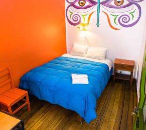 Giường trong phòng chung tại Dragonfly Hostels Cusco