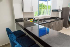 Кухня или мини-кухня в VILLA MANDALAY
