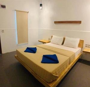 Postel nebo postele na pokoji v ubytování Onederz Sihanoukville