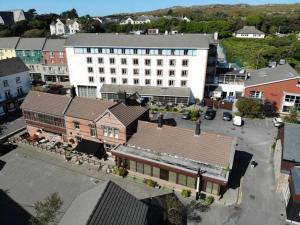 an aerial view of a town with a large building at Clifden River View Apartment in Clifden