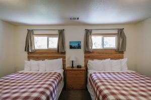 Tempat tidur dalam kamar di View Crest Lodge