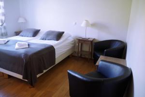 Voodi või voodid majutusasutuse SAXA Guesthouse toas