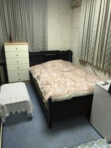 Säng eller sängar i ett rum på プライベートヴィラ岐阜高山