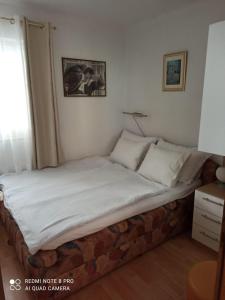 Posteľ alebo postele v izbe v ubytovaní Apartman Robertino 1966