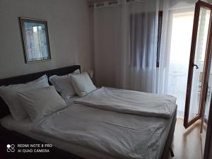 Posteľ alebo postele v izbe v ubytovaní Apartman Robertino 1966