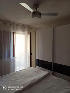 Posteľ alebo postele v izbe v ubytovaní Apartman Robertino 1966