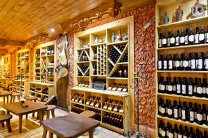 a room filled with lots of bottles of wine at Hotel Intourist Palace Batumi in Batumi