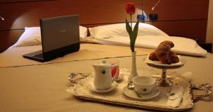 Postel nebo postele na pokoji v ubytování Best Western Hotel Dei Cavalieri
