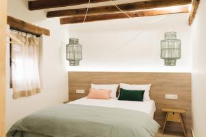Posteľ alebo postele v izbe v ubytovaní Apartaments la Rambla - Esperó de Bolós - 4 pers