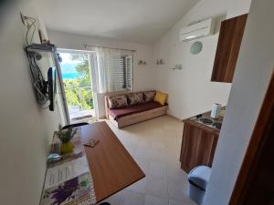Posezení v ubytování Apartmani Božana Viganj