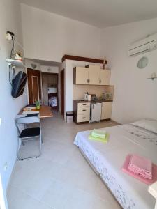 Kuchyň nebo kuchyňský kout v ubytování Apartmani Božana Viganj