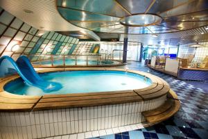 a hot tub on a cruise ship with a slide at DFDS Ferry - MiniCruise Copenhagen to Oslo in Copenhagen
