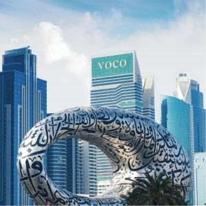 a statue of an elephant in the middle of a city at voco Dubai, an IHG Hotel in Dubai