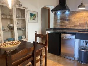Kuchyňa alebo kuchynka v ubytovaní Ca' dei Merli - charming Italian village house