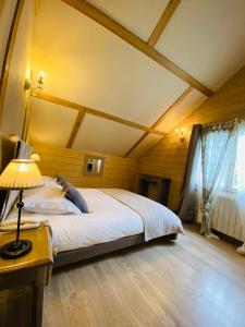 Postel nebo postele na pokoji v ubytování Le Chalet d'Etienne