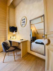 Postel nebo postele na pokoji v ubytování Le Chalet d'Etienne