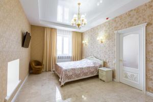 Posteľ alebo postele v izbe v ubytovaní Hotel Premier