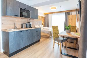 Kuchnia lub aneks kuchenny w obiekcie Apartment Bergsee