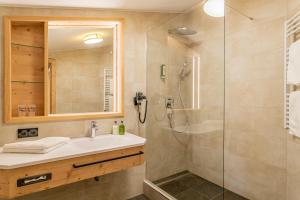 Vannituba majutusasutuses Hotel Tyrol am Haldensee