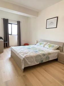 Postel nebo postele na pokoji v ubytování Rabat Falcon Apartment