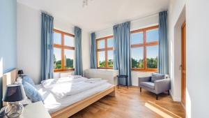 Katil atau katil-katil dalam bilik di Apartamenty Sun & Snow Międzyzdroje Promenada