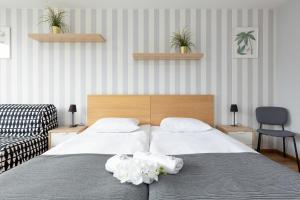 Posteľ alebo postele v izbe v ubytovaní Apartments City Center Powiśle by Noclegi Renters + 17 fotografií