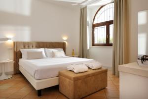 Posteľ alebo postele v izbe v ubytovaní Giotto Country House & Spa