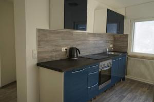 Η κουζίνα ή μικρή κουζίνα στο Gästewohnung Holzheim