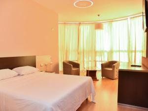 Postel nebo postele na pokoji v ubytování Hotel Continental