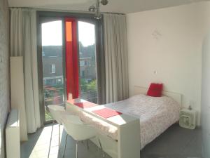 Katil atau katil-katil dalam bilik di PLANT BASED b&b central Bruges