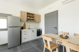 Kuchyň nebo kuchyňský kout v ubytování Yuka Villas Collection
