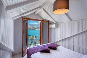 Posteľ alebo postele v izbe v ubytovaní Hotel Aggelos Kefalonia