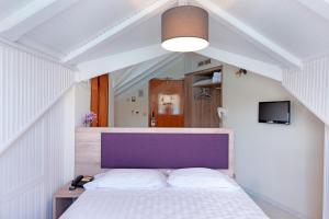 Posteľ alebo postele v izbe v ubytovaní Hotel Aggelos Kefalonia