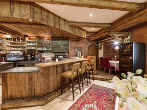 Kuchyň nebo kuchyňský kout v ubytování Hotel Restaurant Sidan