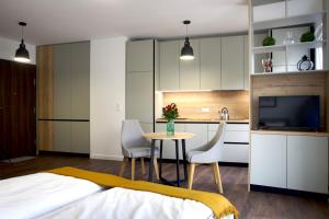 Kuchyňa alebo kuchynka v ubytovaní Essence Apartments Sapphire
